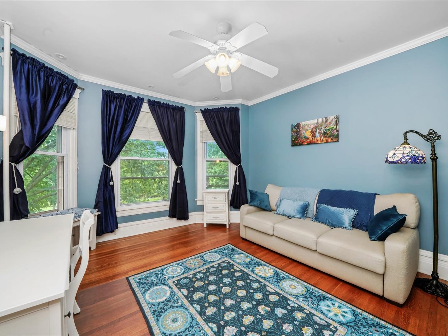 140 Lawton Road Riverside, IL 60546 - Photo 13 of 25 a living room with furniture and a large window