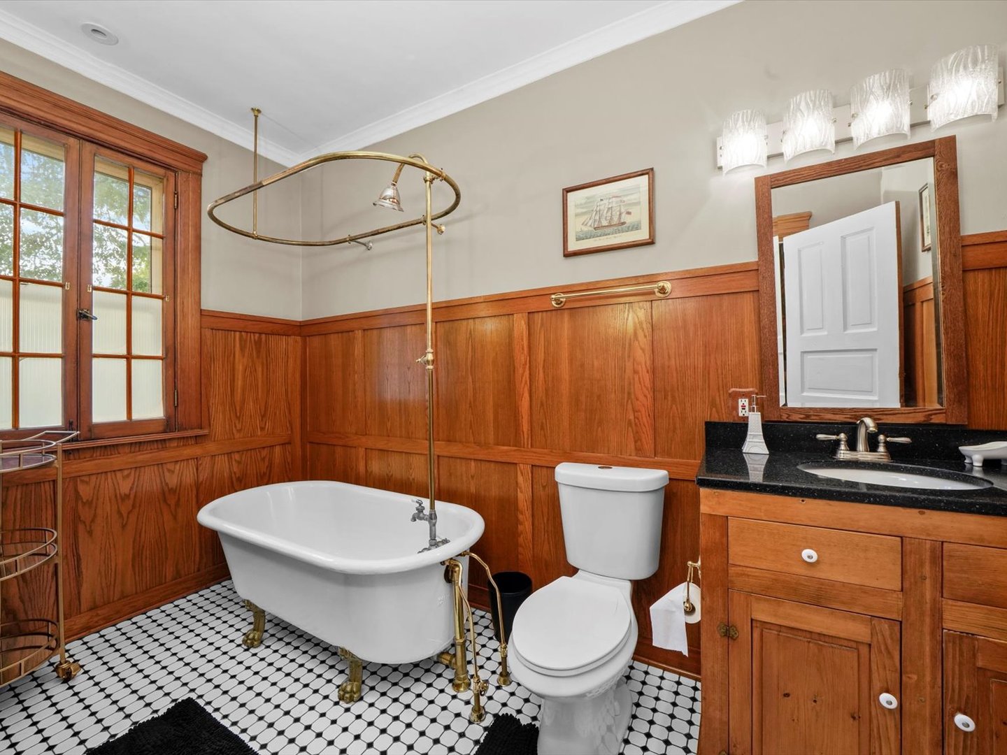 140 Lawton Road Riverside, IL 60546 - Photo 14 of 25 a bathroom with a toilet a sink and a mirror