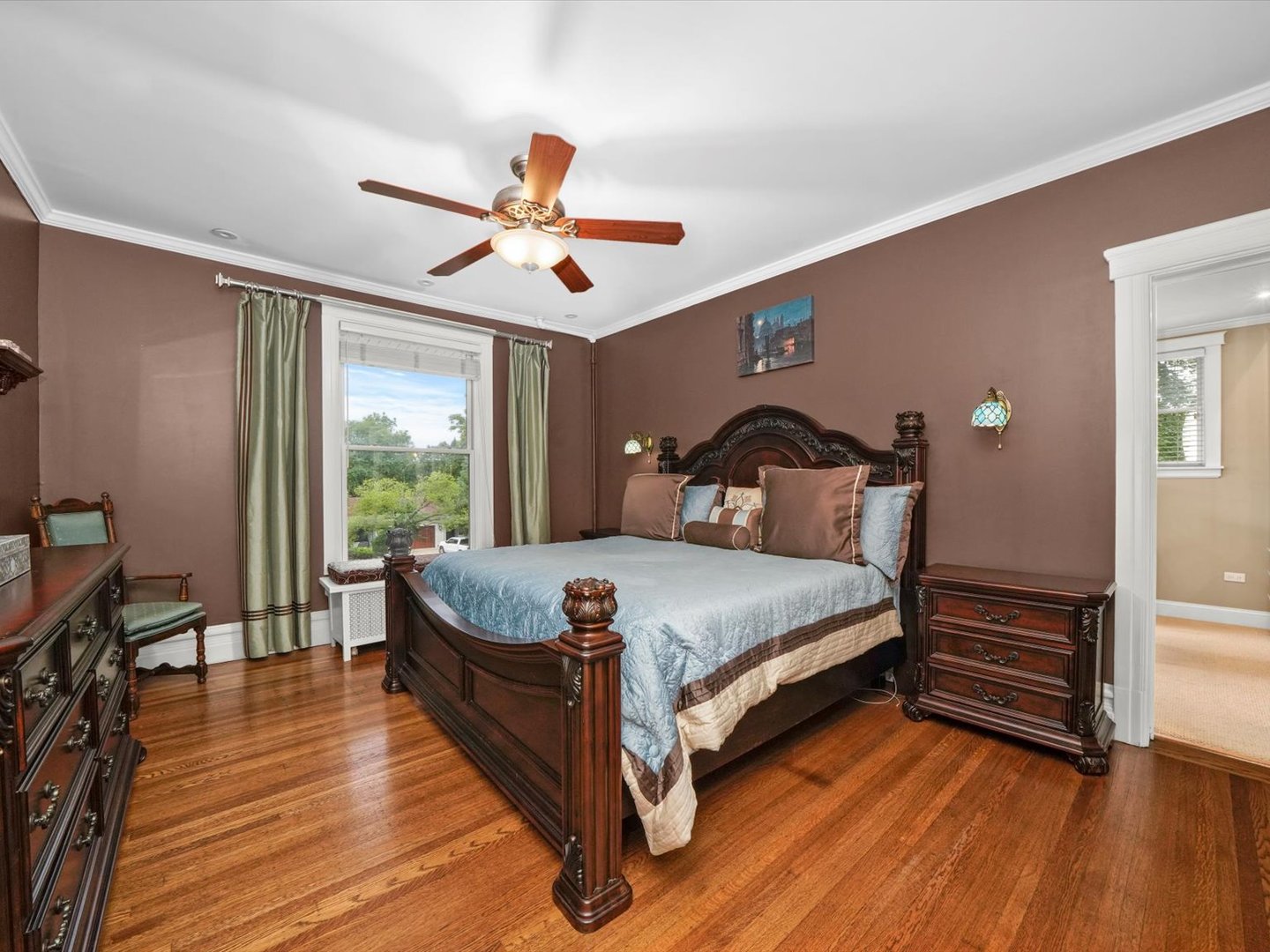 140 Lawton Road Riverside, IL 60546 - Photo 15 of 25 a bedroom with a bed and wooden floor