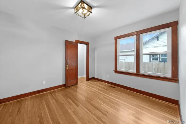 an empty room with windows