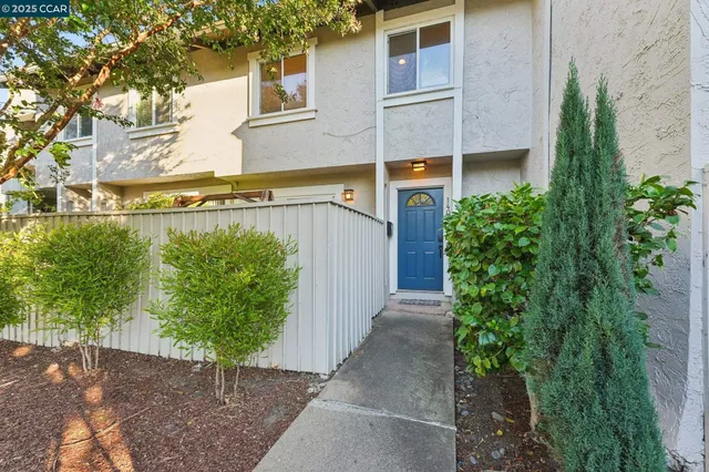 a view of a house with a street