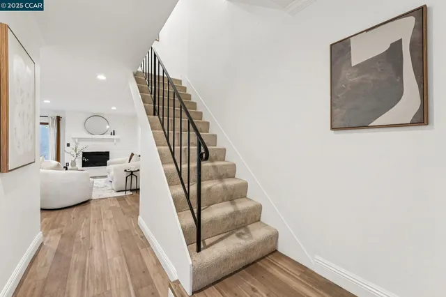 a bedroom with a bed and a lamp