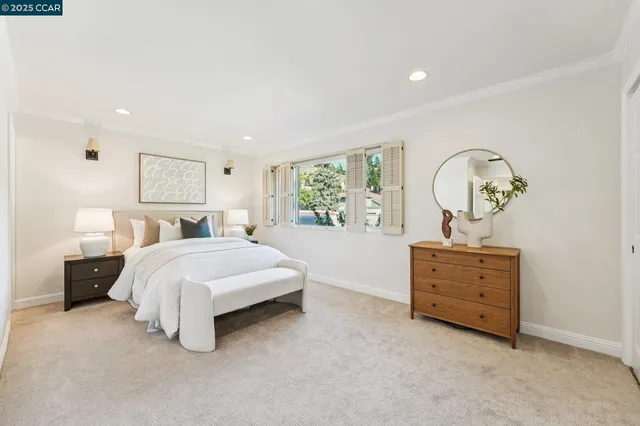 a bathroom with a toilet a sink and a mirror