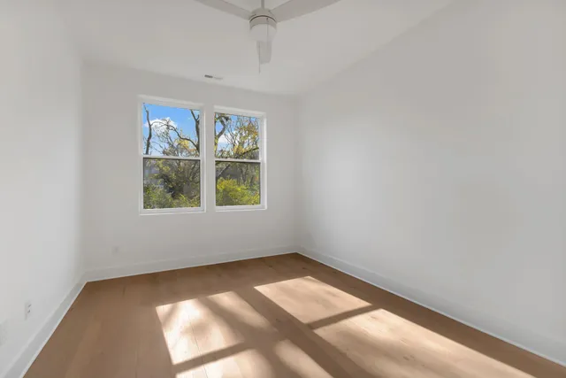 an empty room with windows