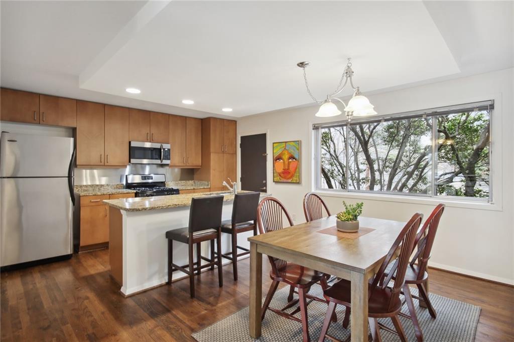 3048 Briarcliff Road Northeast, Unit 6 Atlanta, GA 30329 - Photo 1 of 1 Light filled kitchen and dining area