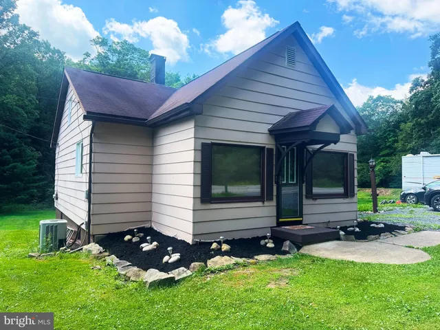 a front view of house with yard