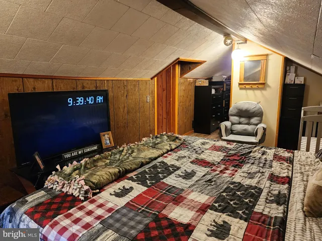 a view of porch with wooden floor