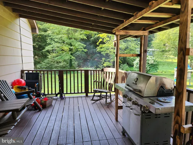 a view of a two chairs in the patio