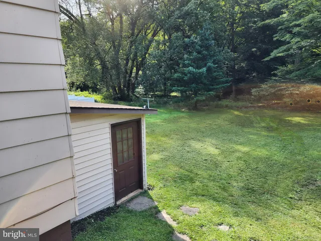 a view of a backyard with a small park