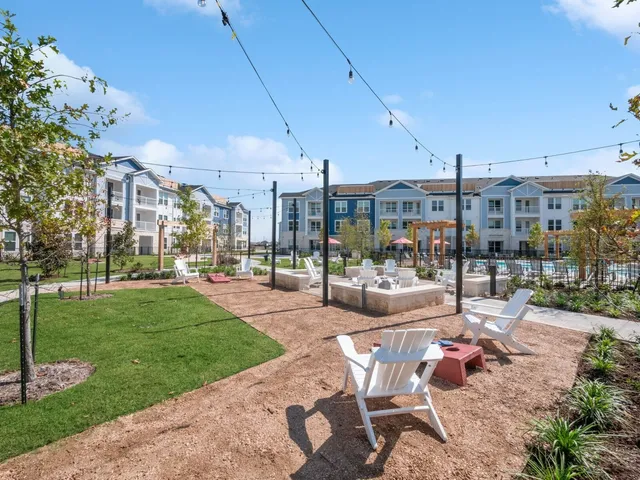 a view of a patio with couches and table
