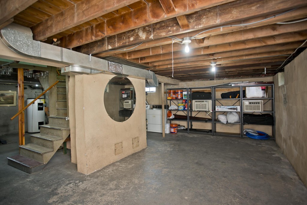 32 Rathbun Street Springfield, MA 01104 - Photo 21 of 26 a view of a garage with furniture