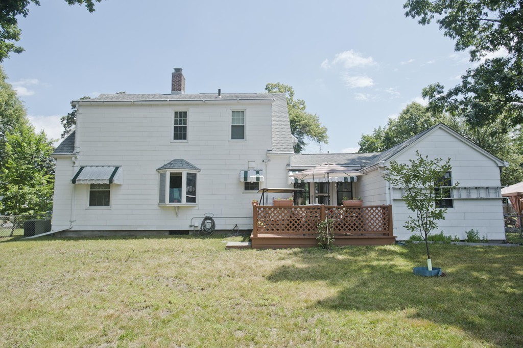 32 Rathbun Street Springfield, MA 01104 - Photo 4 of 26 a front view of house with garden