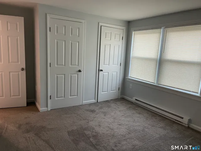 an empty room with window