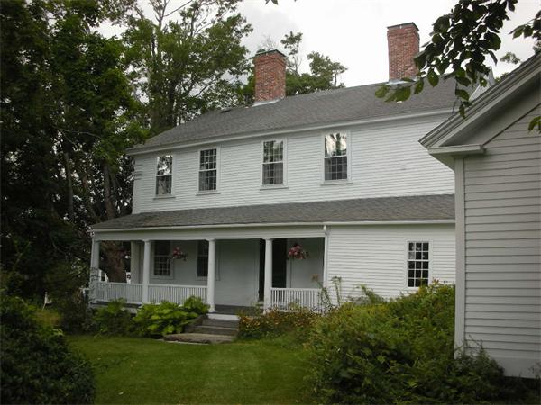 48 Hubbardston Road Princeton, MA 01541 - Photo 3 of 15 a front view of a house with a yard and trees