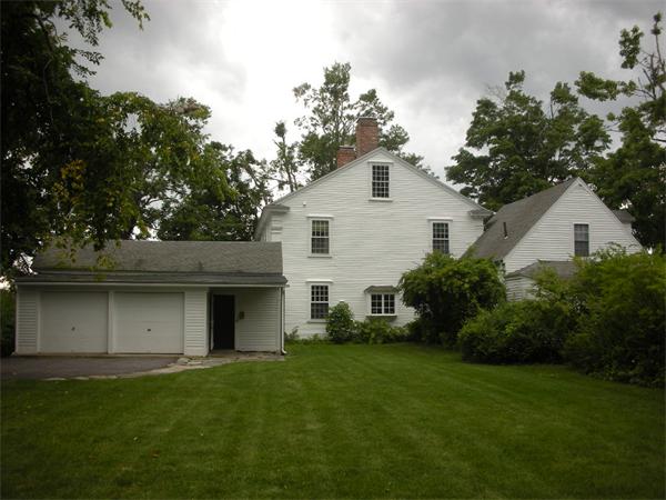 48 Hubbardston Road Princeton, MA 01541 - Photo 4 of 15 a front view of a house with a garden and plants