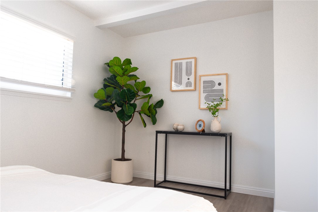 696 West Lori Ann Avenue Azusa, CA 91702 - Photo 12 of 22 a vase of flowers sitting on a table