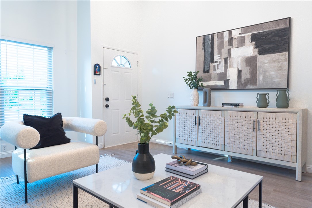 696 West Lori Ann Avenue Azusa, CA 91702 - Photo 3 of 22 a living room with furniture flowerpot and window