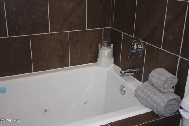 a bathroom with a bathtub