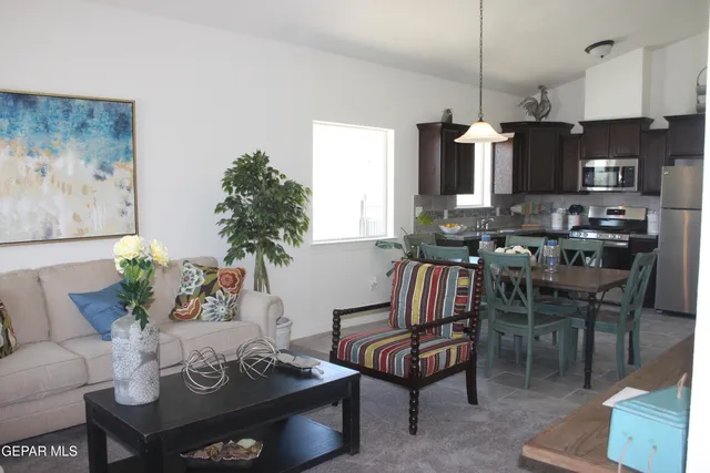 a view of a dining room with furniture