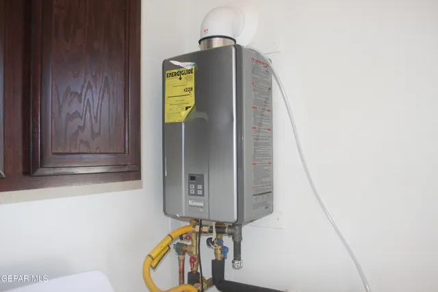 a view of staircase with wooden door