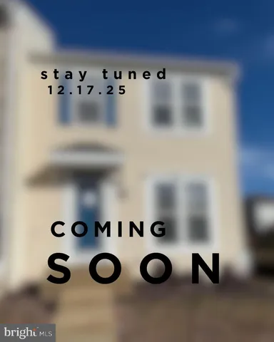 a view of entryway with washer and dryer