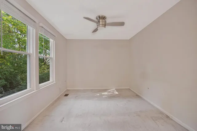 an empty room with a window