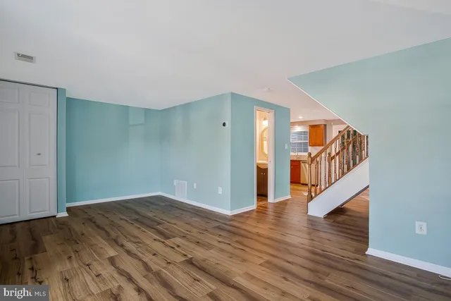 a view of entryway with wooden floor