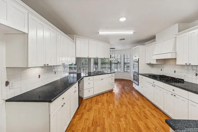 a view of a big room with carpet