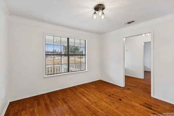 a room with a sink and a window