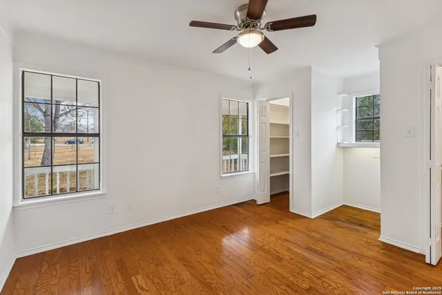 a kitchen with a sink cabinets and window