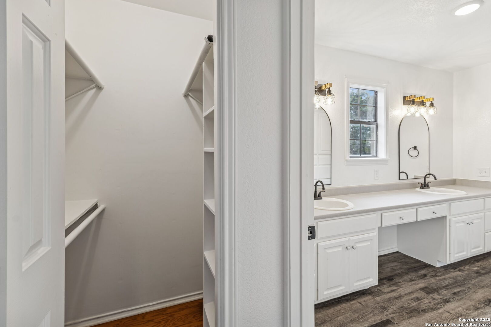 247 Center Point Drive East Center Point, TX 78010 - Photo 44 of 87 a spacious bathroom with a double vanity sink a mirror and a bathtub