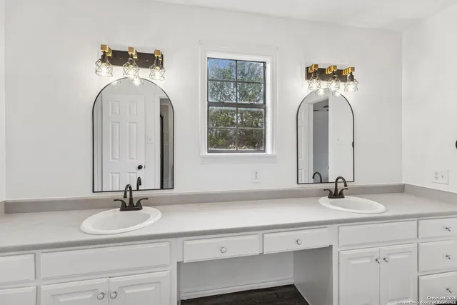 a view of a patio with table and chairs