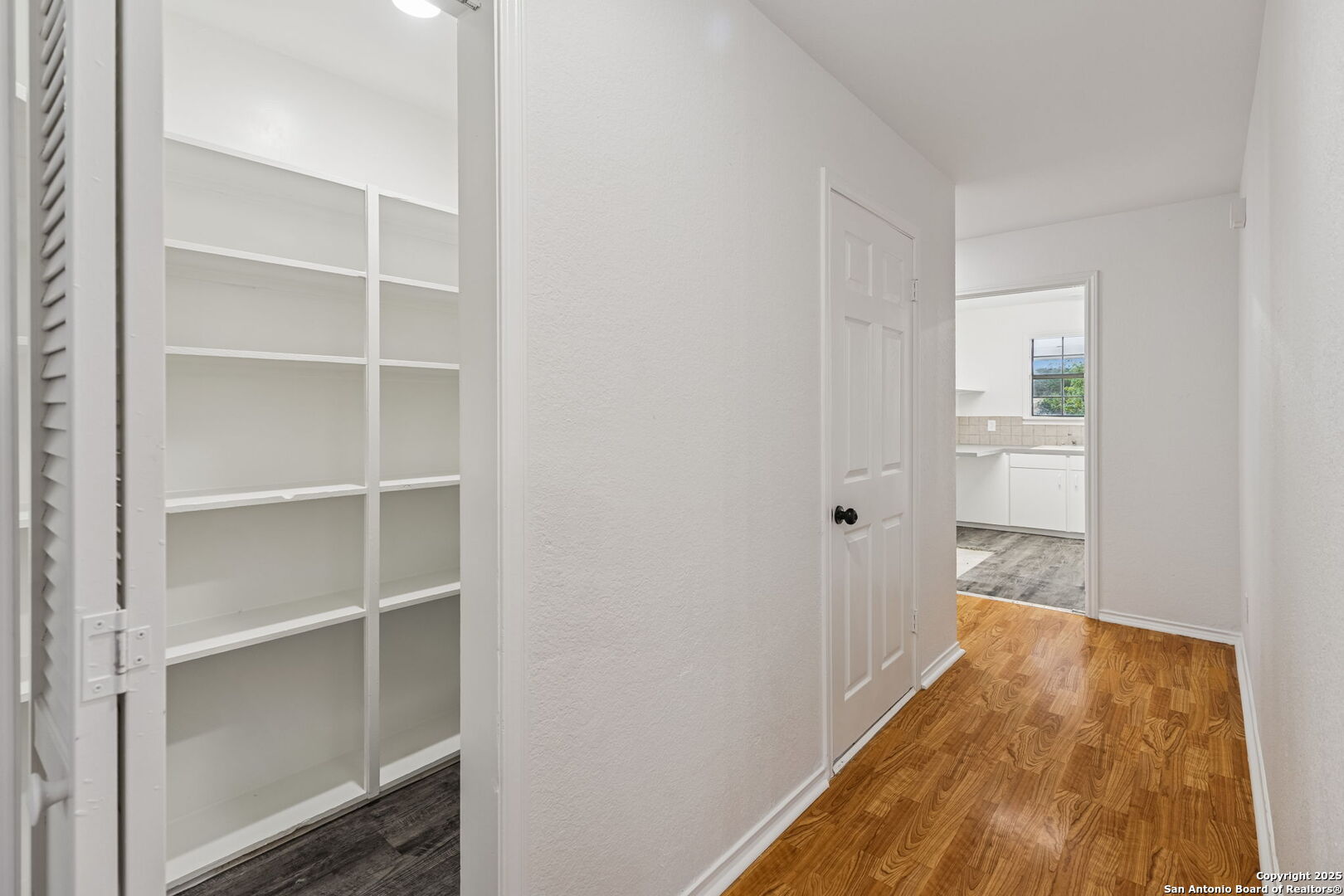 247 Center Point Drive East Center Point, TX 78010 - Photo 52 of 87 a view of a hallway with wooden floor and closet
