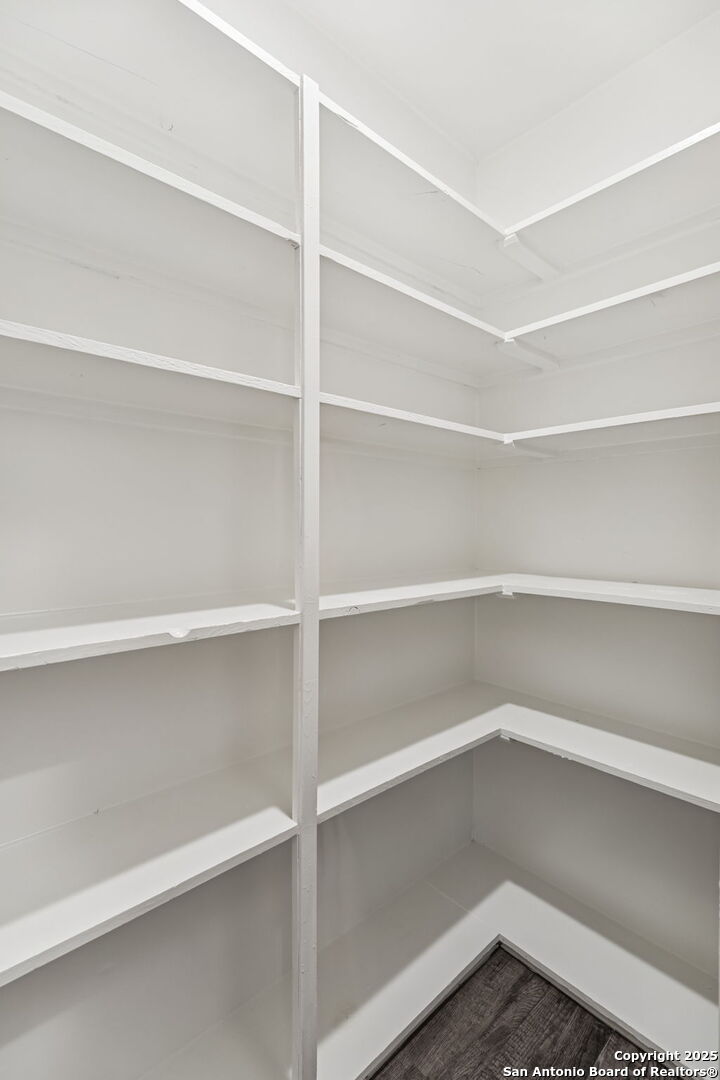 247 Center Point Drive East Center Point, TX 78010 - Photo 53 of 87 a view of walk in closet with empty racks