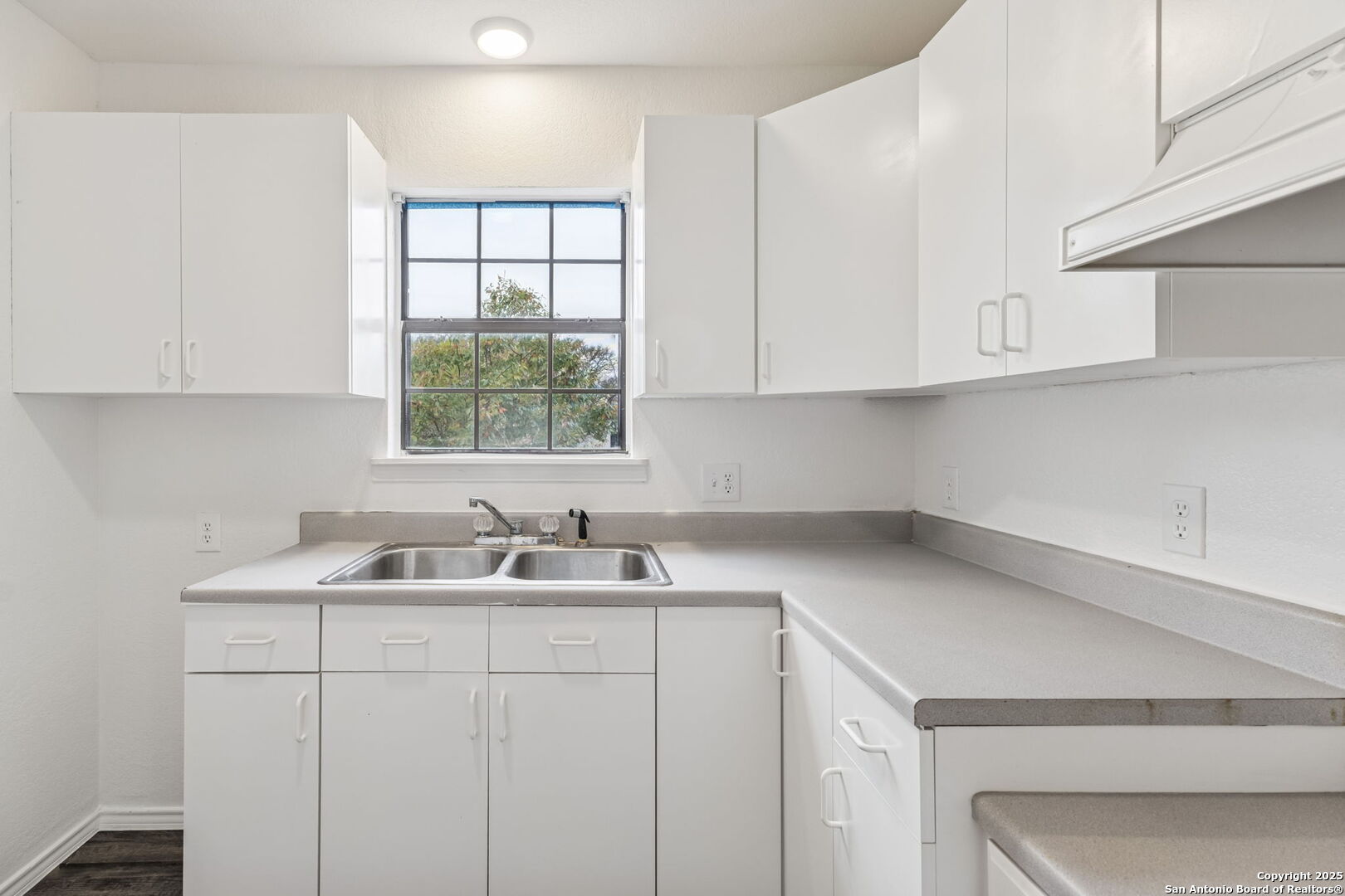 247 Center Point Drive East Center Point, TX 78010 - Photo 61 of 87 a kitchen with a sink cabinets and window