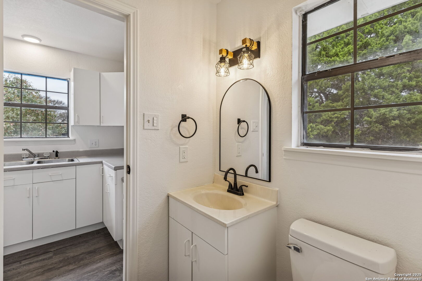 247 Center Point Drive East Center Point, TX 78010 - Photo 64 of 87 a bathroom with a sink and mirror with window