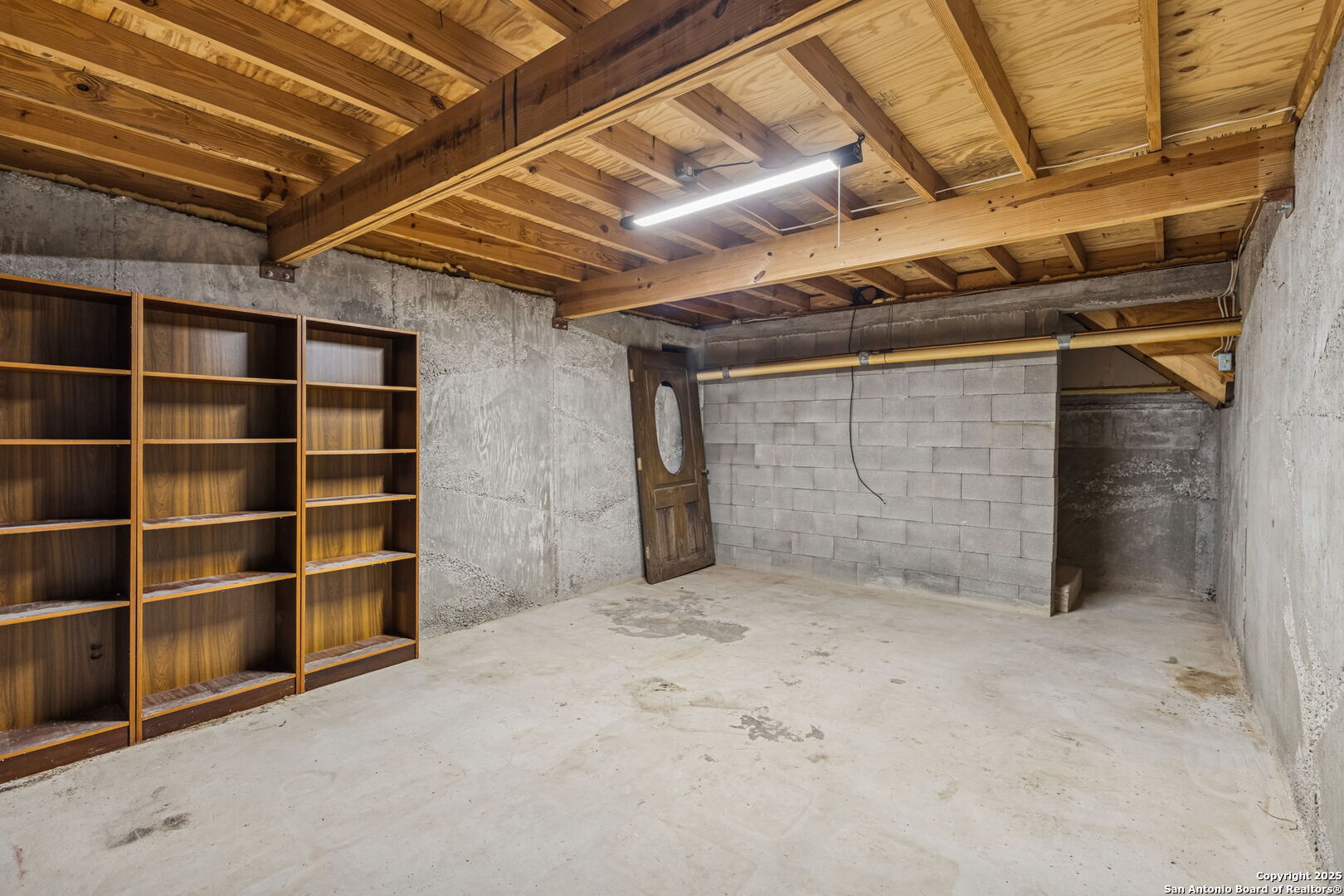247 Center Point Drive East Center Point, TX 78010 - Photo 72 of 87 a view of an empty room with storage