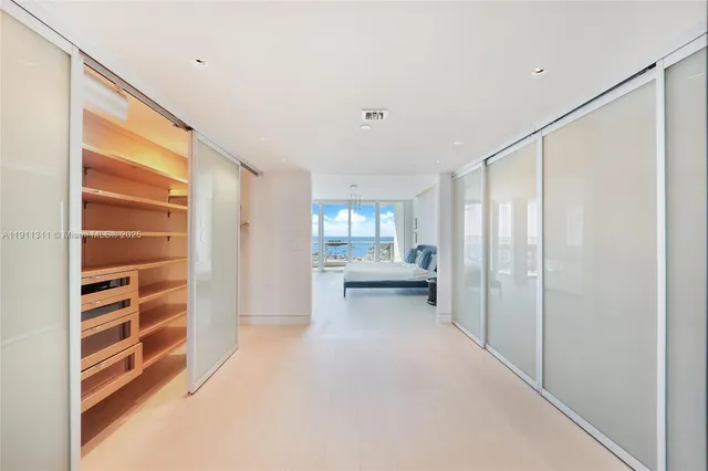 a view of a room with a large window