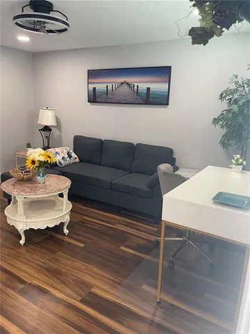 a bedroom with bed and window