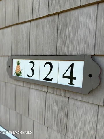 a large kitchen with cabinets a sink and appliances