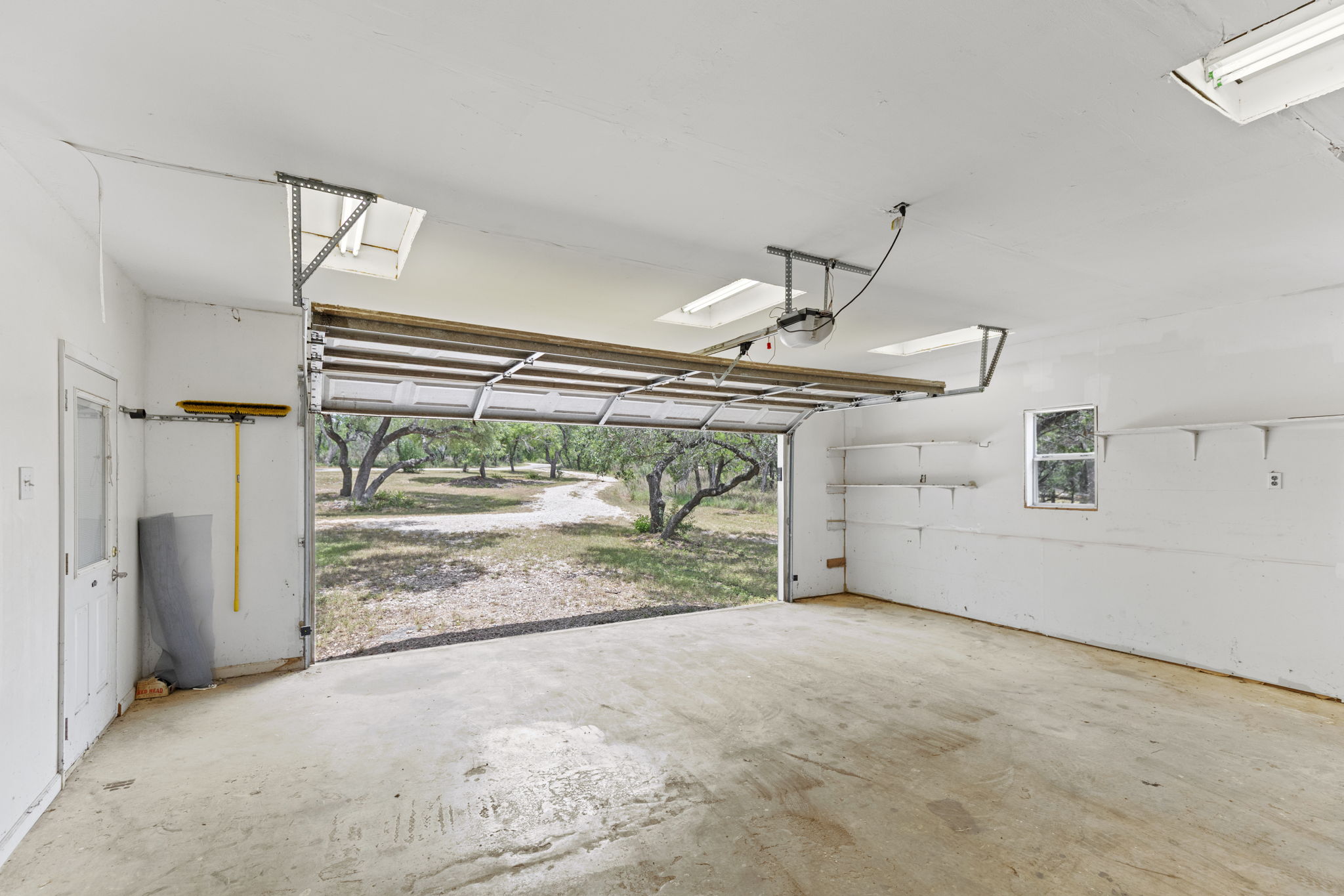 20001 Hamilton Pool Road Dripping Springs, TX 78620 - Photo 35 of 40 Large 4-car garage (lengthwise)