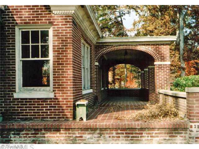 Facade/Exterior Front. Side view of front porch