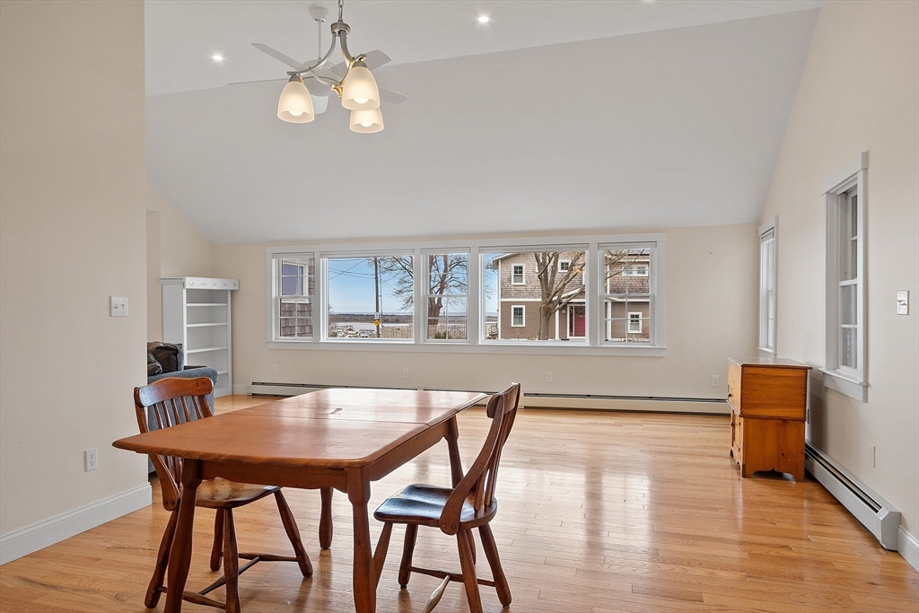 38 Plover Hill Road Ipswich, MA 01938 - Photo 11 of 42 a view of a dining room with furniture and wooden floor