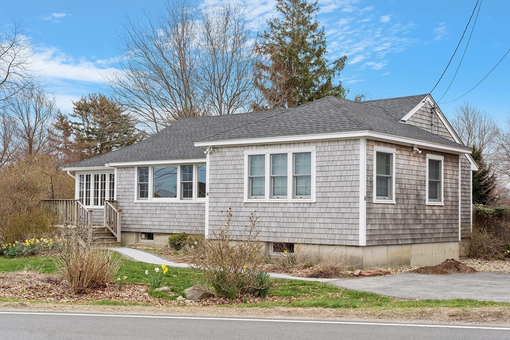 38 Plover Hill Road Ipswich, MA 01938 - Photo 22 of 42 a front view of a house with a yard