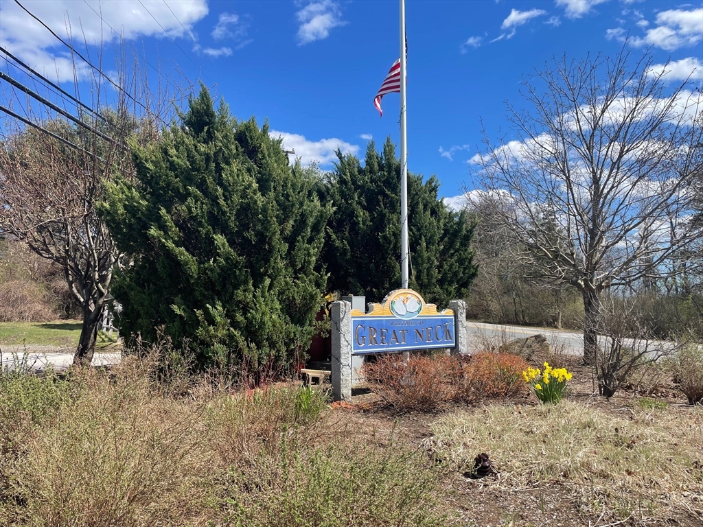 38 Plover Hill Road Ipswich, MA 01938 - Photo 40 of 42 a front view of a house with a yard and tree
