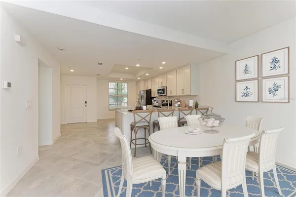 a view of a kitchen with a sink and cabinets