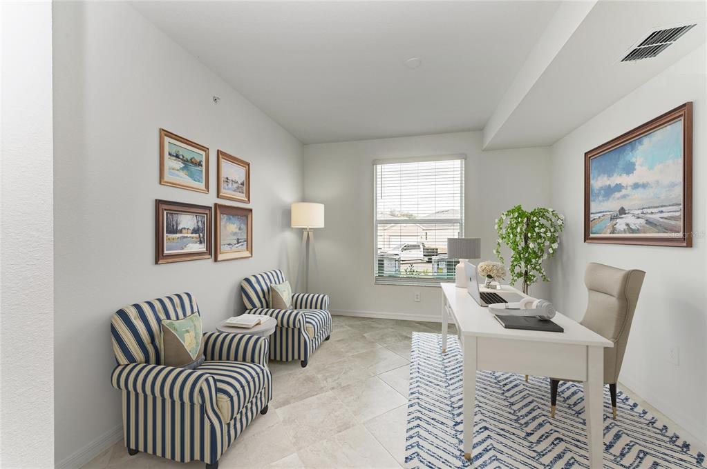 19015 Scallop Loop, Unit 7118 Lakewood Ranch, FL 34211 - Photo 26 of 48 a living room with furniture and a large window