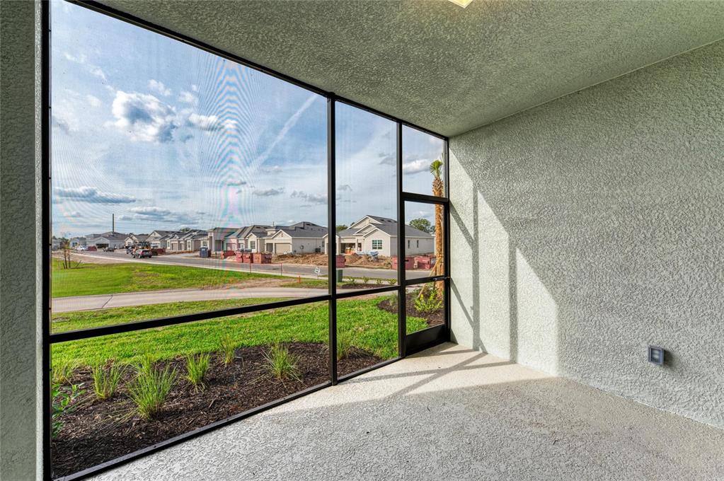 19015 Scallop Loop, Unit 7118 Lakewood Ranch, FL 34211 - Photo 33 of 48 a view of a back yard from a balcony
