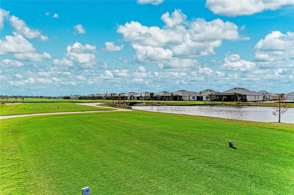 19015 Scallop Loop, Unit 7118 Lakewood Ranch, FL 34211 - Photo 37 of 48 a view of a green field