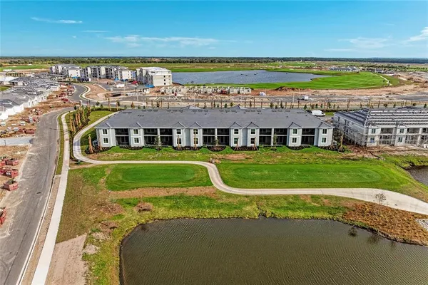 a view of a city with lawn chairs
